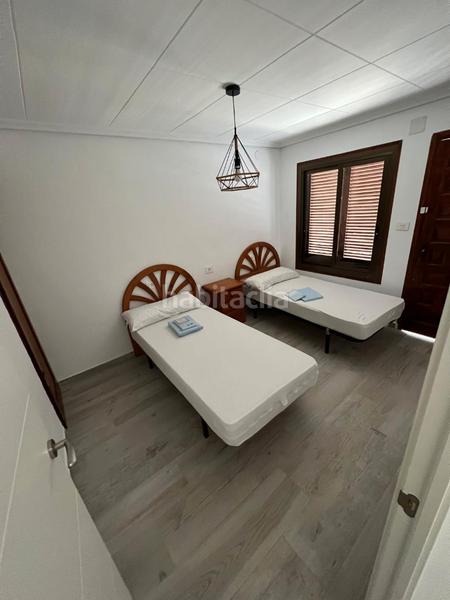 Foto 77579e82-9d32-4e50-8297-ba14dcebf54e. Casa aparellada amb xemeneia calefacció aparcament a Almazora / Almassora