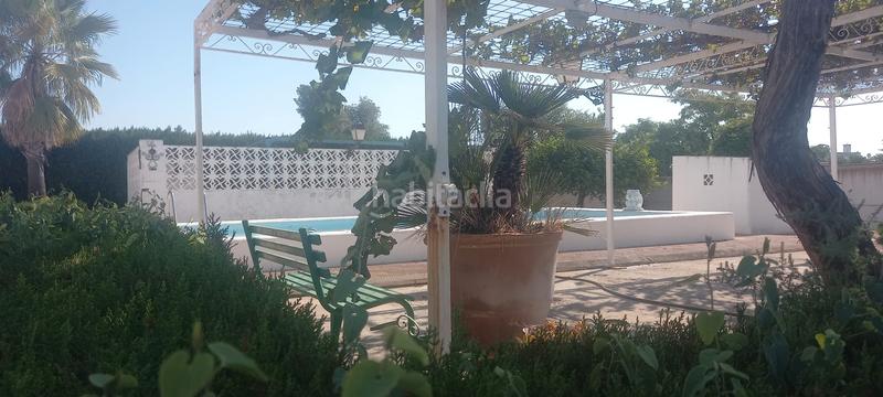 Foto 77ee62ba-a40d-4da8-9a52-43ad78adeac9. Chalet dans calle amistad 147 dans Oromana Alcalá de Guadaira