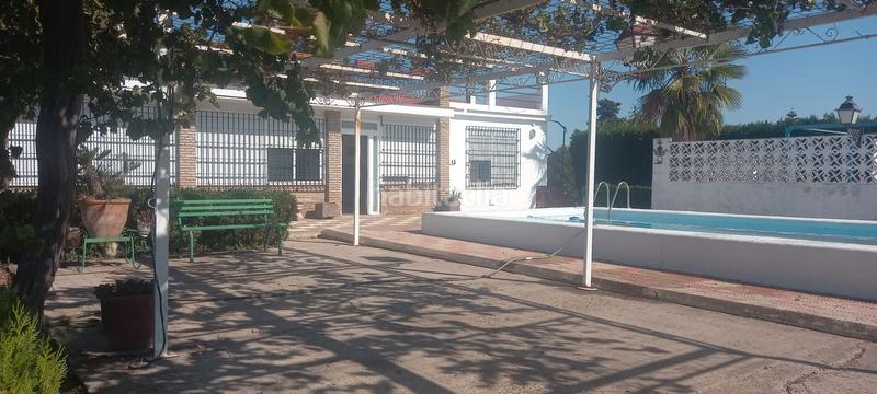 Foto df809953-8285-4430-9b4e-50c83bcdf1df. Chalet dans calle amistad 147 dans Oromana Alcalá de Guadaira