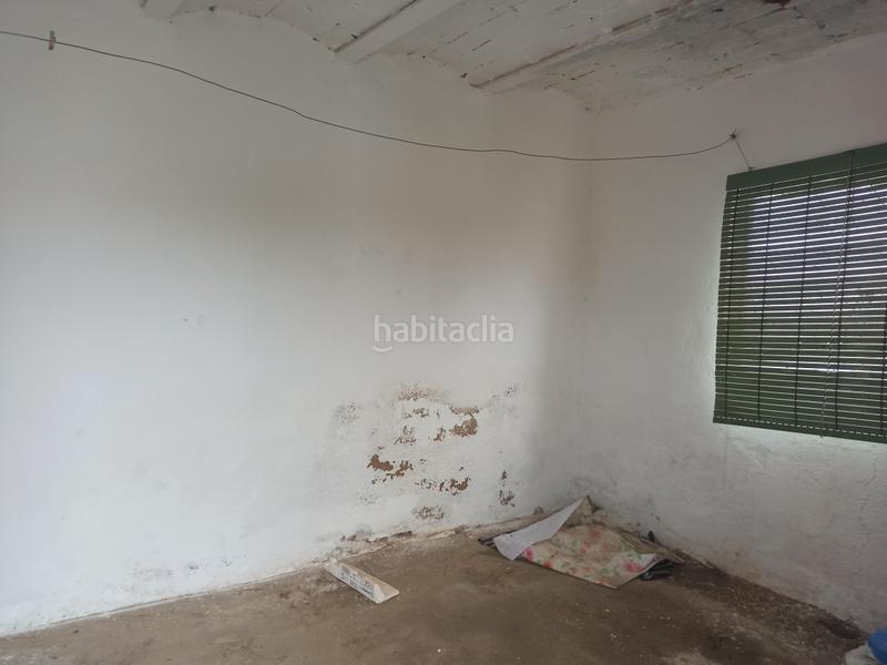 Foto 9e7e2180-dde3-4965-89f6-240b61304786. Casa adossada a Cumbres Mayores