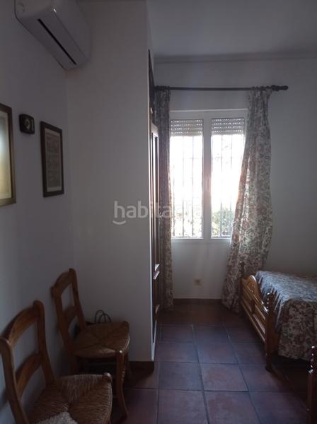 Foto 7065c72b-ae6b-46f1-916a-0bcca5c57cb8. Chalet con camino riscaldamento parcheggio piscina in Carmona