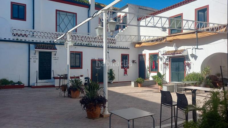 Foto dc5f3681-9f68-46ea-82c6-6eaa734a0de3. Chalet con camino riscaldamento parcheggio piscina in Carmona