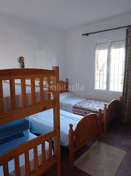 Foto f9df0639-1674-40a6-8962-087075e285b8. Chalet con camino riscaldamento parcheggio piscina in Carmona