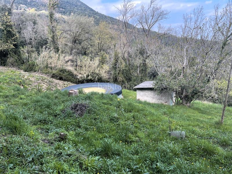 Foto 09c2ffea-f4cd-42c9-a0ff-a2cf2a486888. Masia amb xemeneia calefacció aparcament a Mieres