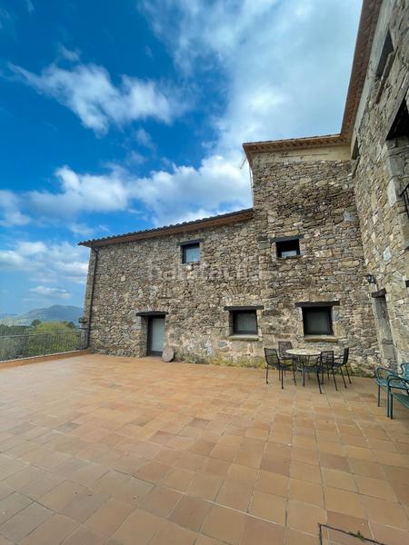 Foto 8cf7125b-24d5-4186-8ae5-e9699830d9bd. Masia amb xemeneia calefacció aparcament a Mieres