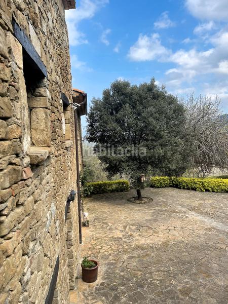 Foto a322c34b-064e-4aa2-8bf6-d1f1f72db6d1. Masia amb xemeneia calefacció aparcament a Mieres