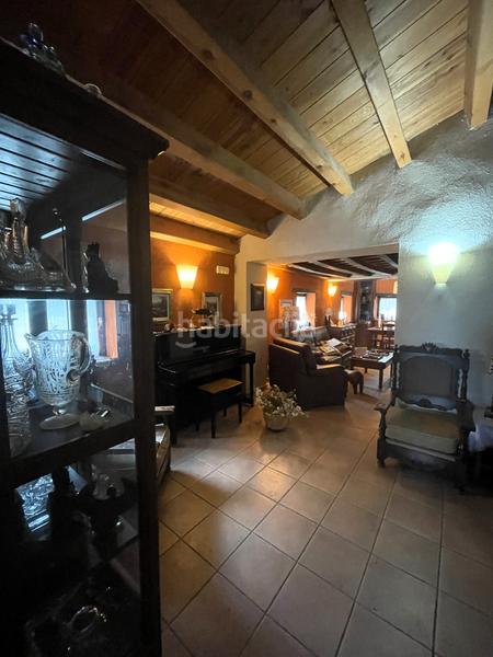 Foto b1c24cc8-49d6-448a-b30f-a8dead9aca1d. Masia amb xemeneia calefacció aparcament a Mieres