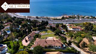 Affitto Chalet in El Faro de Calaburra - Chaparral. Villa espaciosa en alquiler con vistas panorámicas al mar y jard