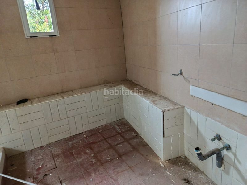 Foto 0d68d400-67a9-4f04-9067-90ee188c0c17. Casa adossada a carrer baix 9 a Vallés
