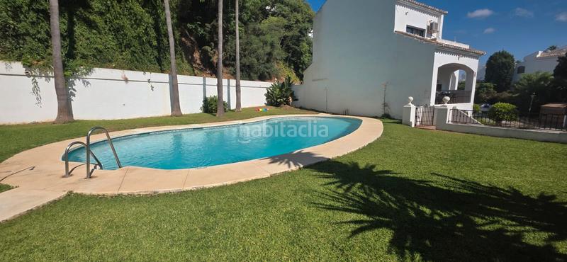 Foto 4e10c9bc-b6c4-469b-8175-1028de50e1fd. Reihenhaus mit parking pool in Riviera del Sol Mijas