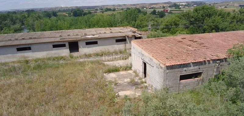 Foto f1fe3fc2-da64-43a7-8840-3d4371986844. Fabrikhalle in Vallfogona de Balaguer