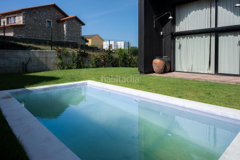 Foto 7f6f52ce-459b-4eac-bc10-cf8ea62b8fe8. Casa con riscaldamento piscina in Liáns Oleiros
