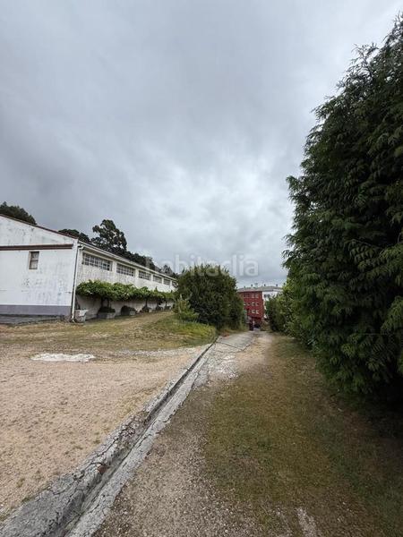 Foto 04bbdba1-3d04-44dd-98c4-029cd2ccbcc4. Bâtiment à usage industriel dans Oseiro Arteixo