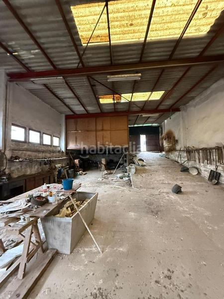 Foto 1a7da608-d574-4dee-a968-0d69f5a2f9dc. Bâtiment à usage industriel dans Oseiro Arteixo