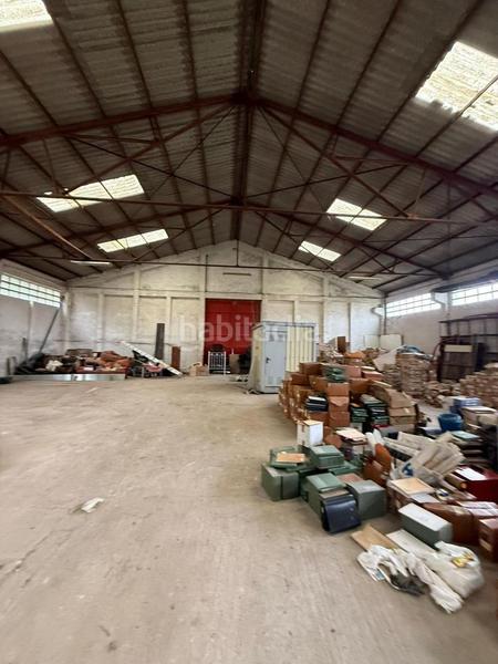 Foto a8689f58-cb20-4ca9-a2eb-20ba32471ce4. Bâtiment à usage industriel dans Oseiro Arteixo