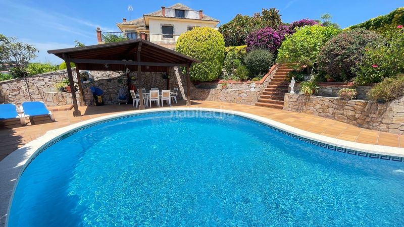 Foto dfa4ee27-b512-4f02-9865-7143cceca6d2. Casa amb piscina a Sant Cebrià de Vallalta