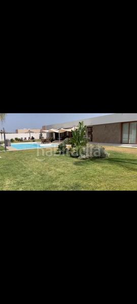 Foto df1d4bdc-9be0-4557-9baf-68eb298c1642. Casa chalet independiente con una moderna edificación en Mairena del Aljarafe