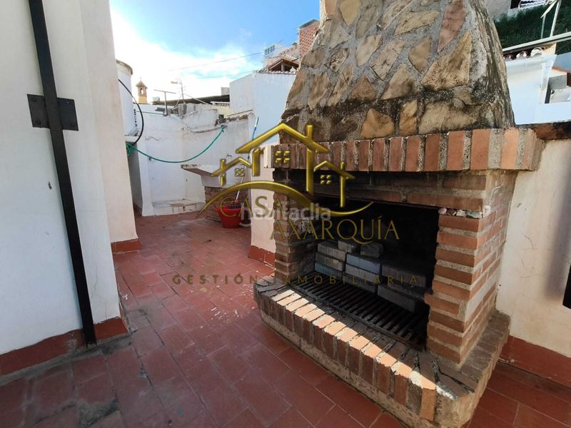 Foto f3327a14-86de-470d-8424-3af517cc81ed. Casa amb xemeneia a Centro Histórico Vélez - Málaga