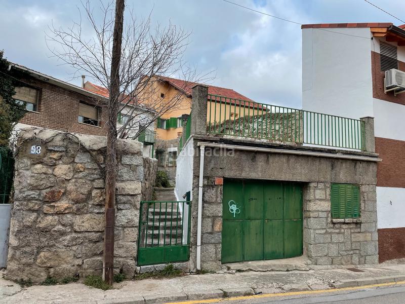 Foto b8c1eb4e-c838-49b3-92f1-ee125df958a6. Casa a schiera con parcheggio in Cercedilla