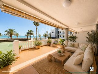Apartament a Calle torrecaida 11. Espectacular bajo con gran terraza en primera línea de mar  acce