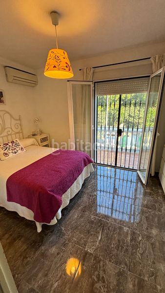 Foto 53a5e63a-061e-49b8-acf3-e3e1009c64b4. Casa adossada amb calefacció piscina a El Bajondillo Torremolinos