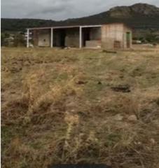 Casa a Sierra de Fuentes. 25000 m2 terreno con nave