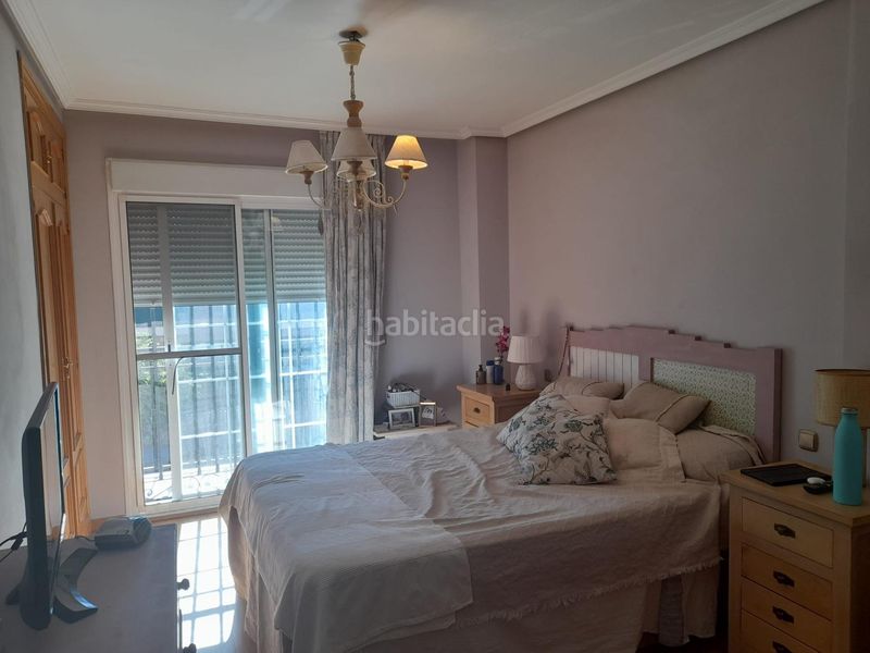 Foto ad0e27c5-8901-485d-8760-2b515f7956c4. Casa adossada amb calefacció aparcament piscina a Cáceres