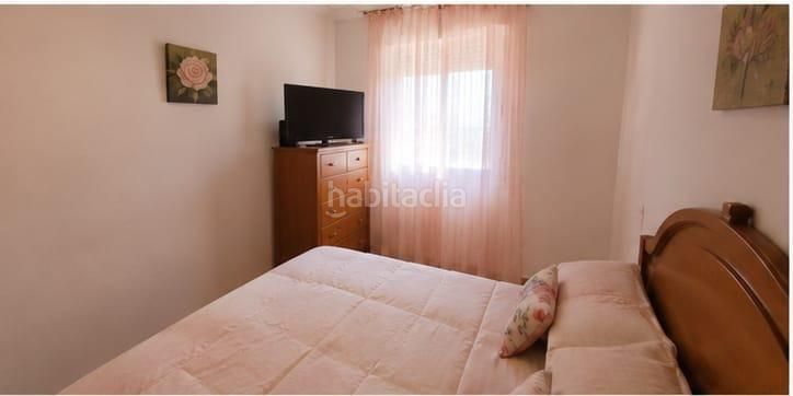 Foto 5e3f0f80-dd65-4ac8-803b-64b93cd45066. Casa adossada amb aparcament a Montesol - Mejostilla Cáceres