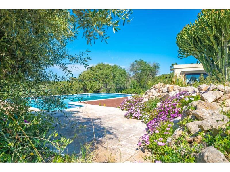 Foto b55acb60-2278-4cd6-932f-26726434c909. Chalet con riscaldamento parcheggio piscina in Sant Lluís-s´ullestrar-torret Sant Lluís