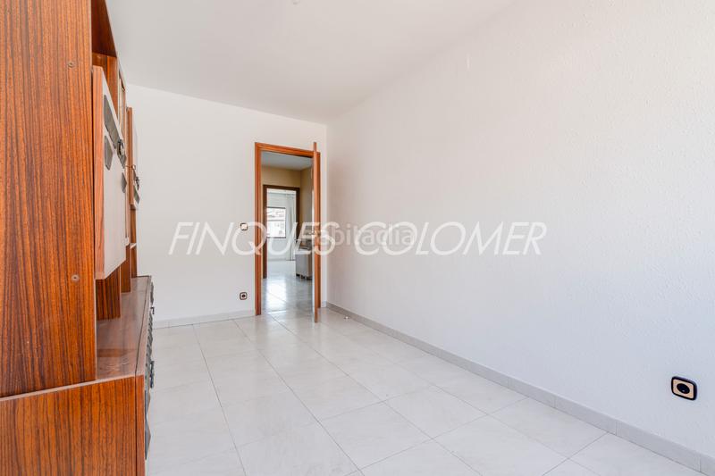 Foto 1c88684e-4044-49b6-9339-5cf690db44be. Casa adosada con terraza y garaje en La Serreta Rubí