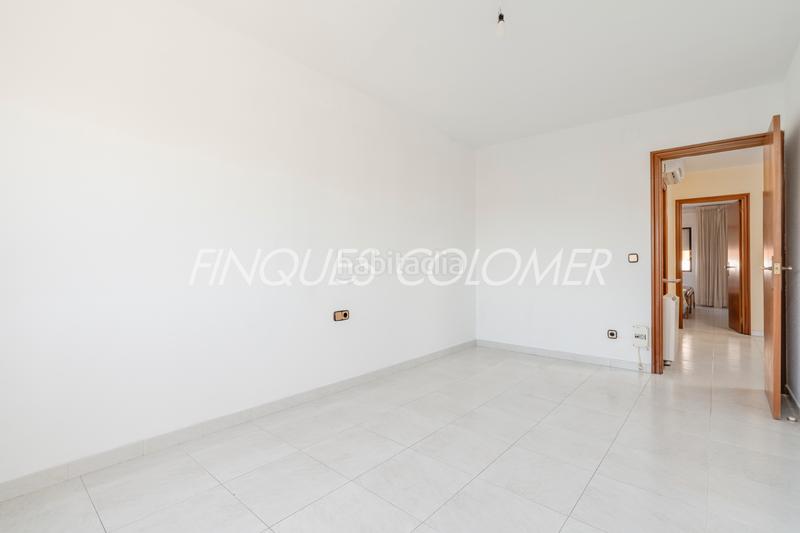 Foto 68ab413c-b4ac-46a6-a931-ae3f3e278b7a. Casa adosada con terraza y garaje en La Serreta Rubí