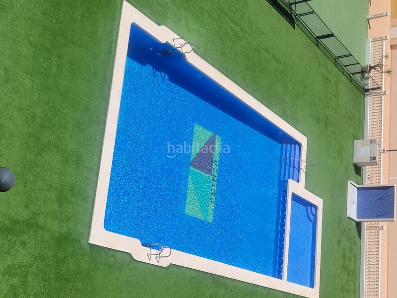 Foto 3e1beaa3-6fba-4c8a-8c85-36a98f1e3d9e. Planta baixa amb aparcament piscina a Islas Menores-Mar de Cristal Cartagena