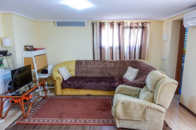 Foto 705f7f4e-5832-46d7-bf16-9e6a334a5862. Casa aparellada amb aparcament a Punta Prima Torrevieja