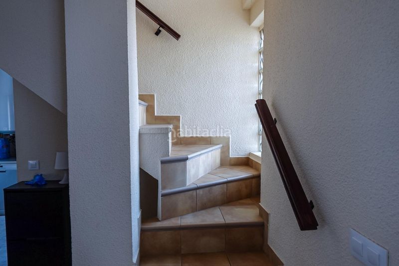 Foto cf56e2cd-8717-47e2-8049-cc0390c3067a. Casa aparellada amb aparcament a Punta Prima Torrevieja