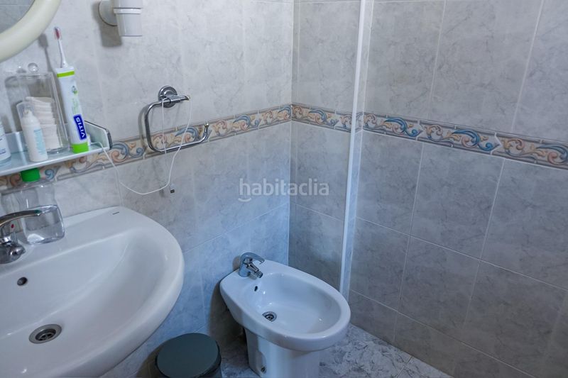 Foto eaa0111c-dac9-4577-ac02-7332f7afb4ef. Casa aparellada amb aparcament a Punta Prima Torrevieja