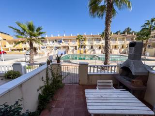 Casa  Serviola. Bungalow planta baja con dos terrazas y piscina comunitaria  gua