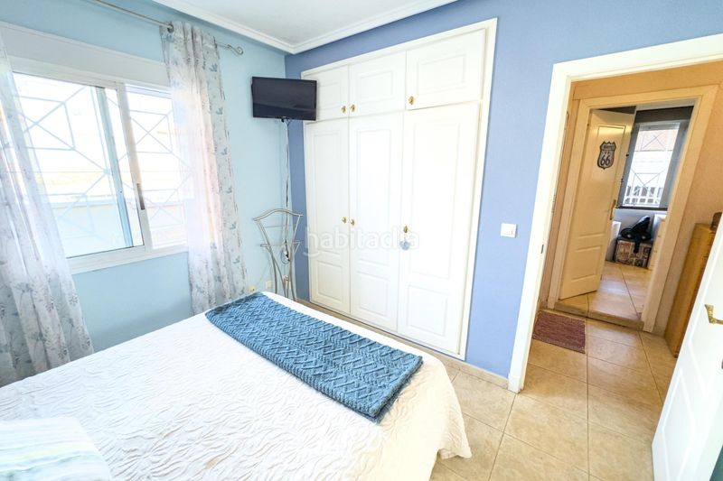 Foto 2c9695d8-2b3e-4963-90e1-c2310a9fd3ce. Casa aparellada amb aparcament piscina a Aguas Nuevas Torrevieja