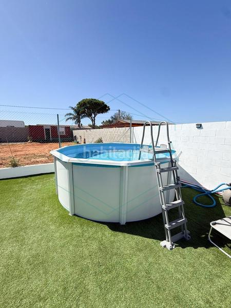 Foto 527bd206-ee09-4a90-b429-6190491c6a42. Chalet se vende parcela rústica indivisa con casa prefabricada en Chiclana de la Frontera