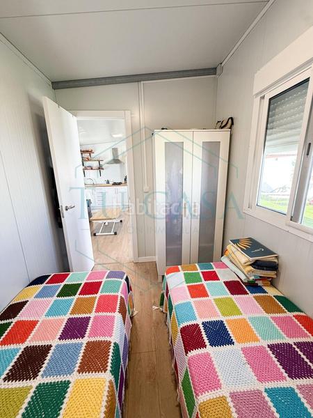 Foto 880bfe25-b5df-4e8c-9e4f-482fa34c5985. Chalet se vende parcela rústica indivisa con casa prefabricada en Chiclana de la Frontera