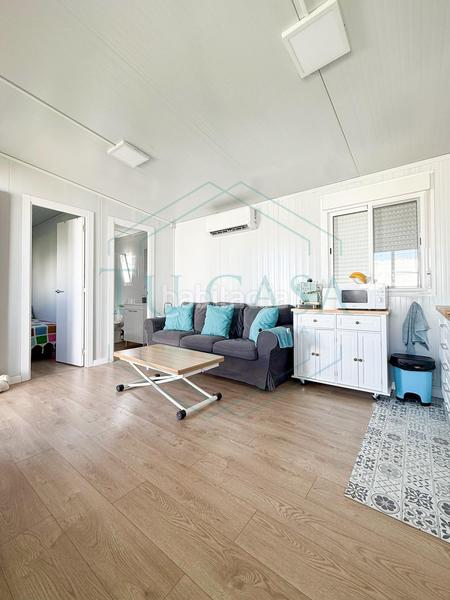 Foto d7ef938d-a5e2-4d46-9f15-a04f021ab3a1. Chalet se vende parcela rústica indivisa con casa prefabricada en Chiclana de la Frontera