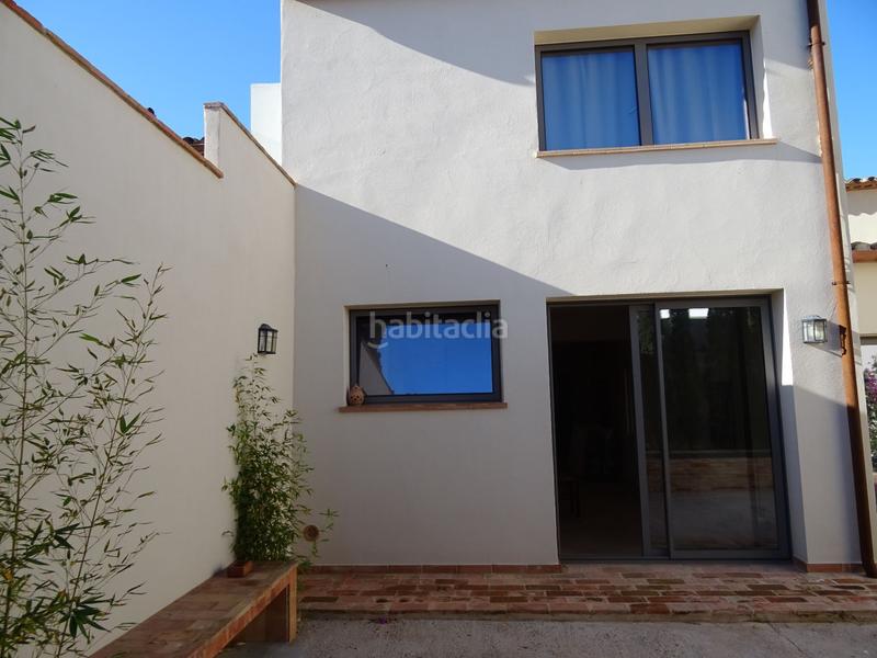 Foto 22dc9dbe-8c55-4bdb-9a69-d42f541b317c. Masía casa de piedra restaurada, patio y piscina , a pocos metros del centro. en Palafrugell