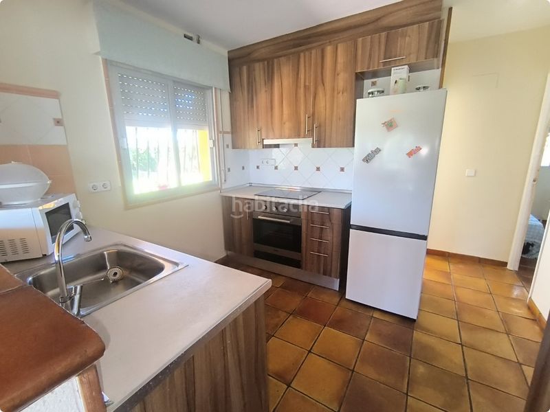 Foto 3006a7ea-4672-47e8-89a5-9a1d294c7618. Casa amb aparcament a Oliva playa Oliva