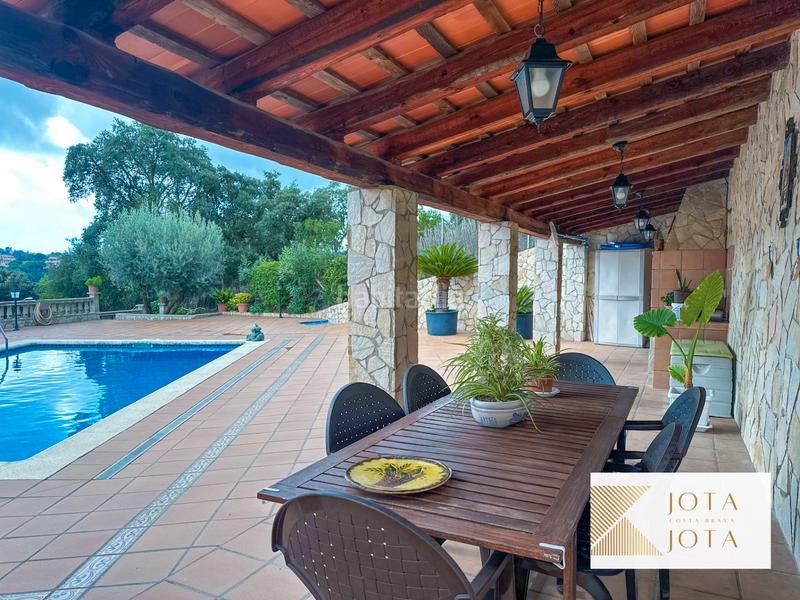 Foto 8c03035d-8b6e-4a4f-ac7f-eea360a0da98. Maison avec cheminée parking piscine dans Aiguaviva Parc Vidreres