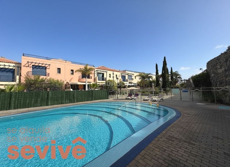 Foto 116f56d1-0c9e-4db7-ac14-a3d09a84a4de. Casa adossada amb aparcament piscina a Palm - Mar Arona