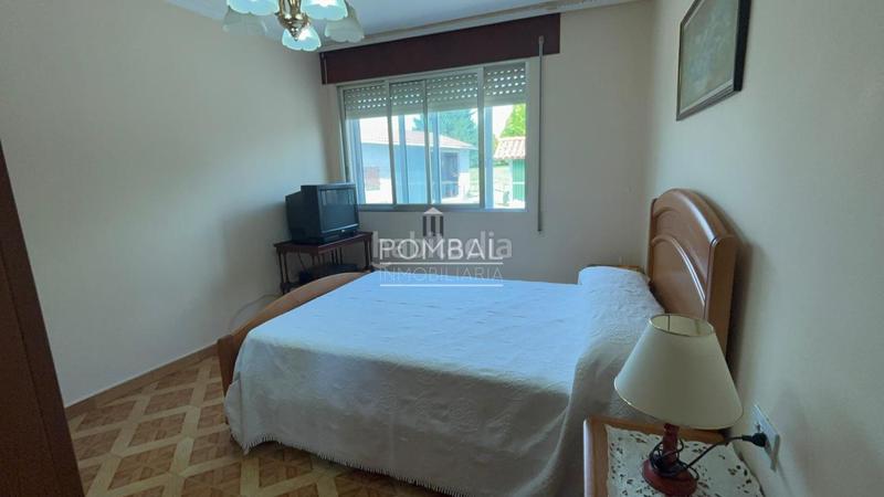 Foto d20b75f7-4022-4401-9a24-a4d5e1132677. Casa pareada en Arzúa