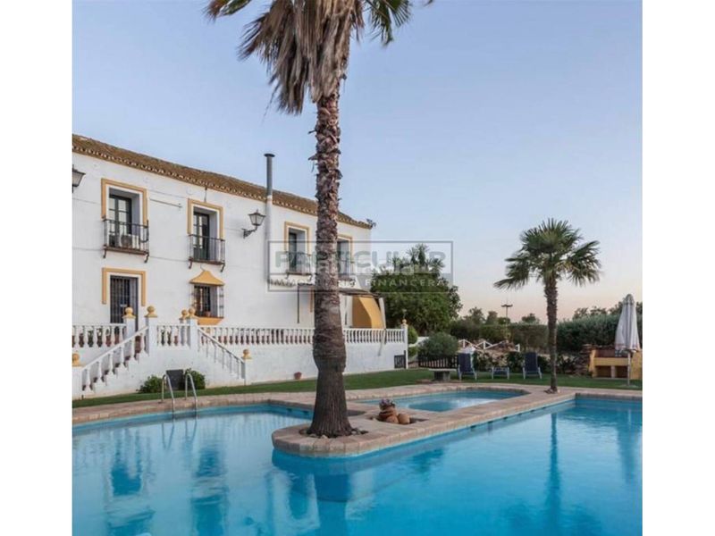 Foto 91b26400-af2a-403f-b9e5-760671bc6c84. Casa amb calefacció aparcament piscina a La Paz Alcalá de Guadaira