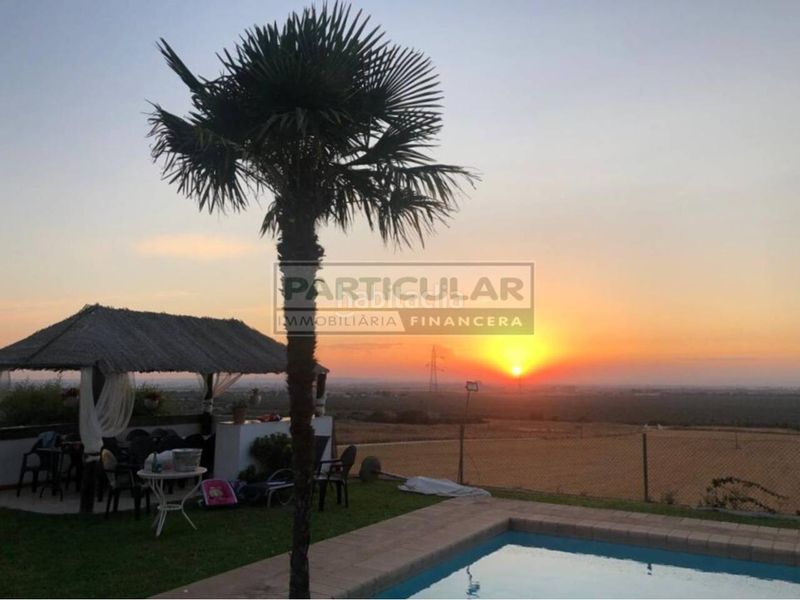 Foto 930bb38d-77f1-4911-99cc-6aa0c884a42d. Casa amb calefacció aparcament piscina a La Paz Alcalá de Guadaira