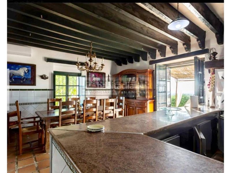 Foto b74ee6d1-fd9d-4dcc-991d-066d450f0968. Casa amb calefacció aparcament piscina a La Paz Alcalá de Guadaira