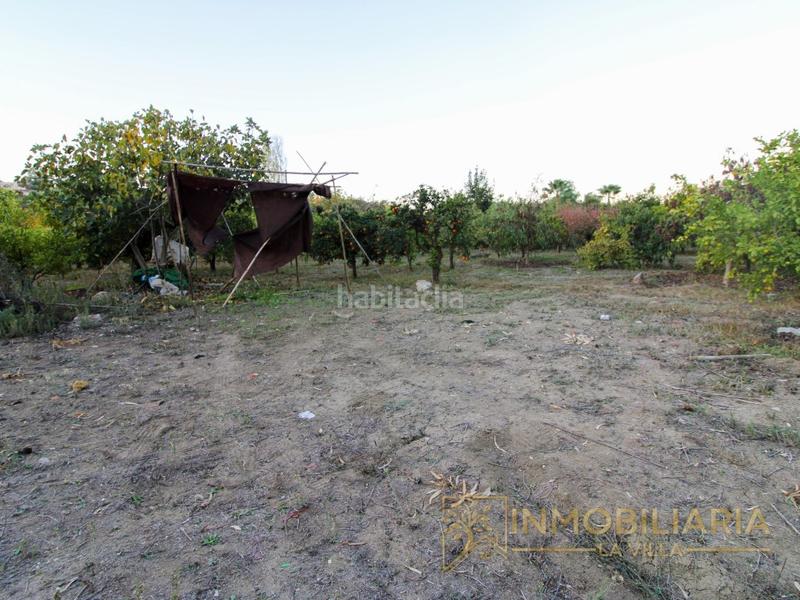 Foto 5f880726-e520-43e8-bcaa-26f9c2627f57. Masía se vende parcela con pequeña casa por cortijo benítez en Coín