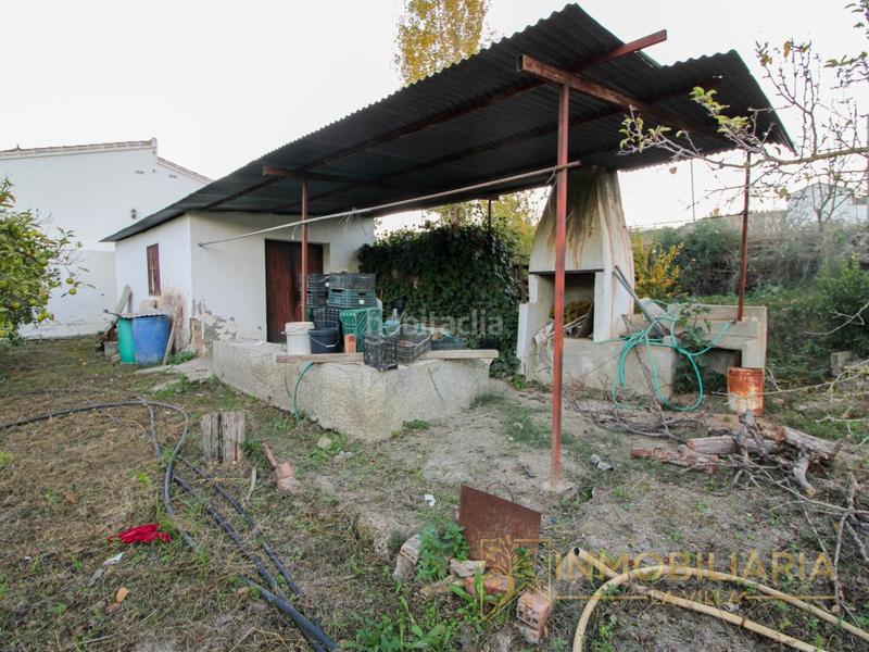 Foto bd8fb5f7-16a7-46f2-8d22-e6646bf0b825. Masía se vende parcela con pequeña casa por cortijo benítez en Coín
